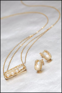 Gold and Pearl Pendant and Earrings