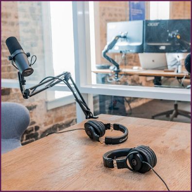An Image of a Podcasting Mic and Headphones