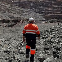 A Mineworker is Walking in a Diamond Mine