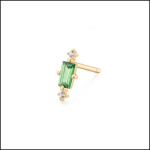 A single stud in tsavorite and white sapphires from Aurelie Gi’s new Zenning Out collection
